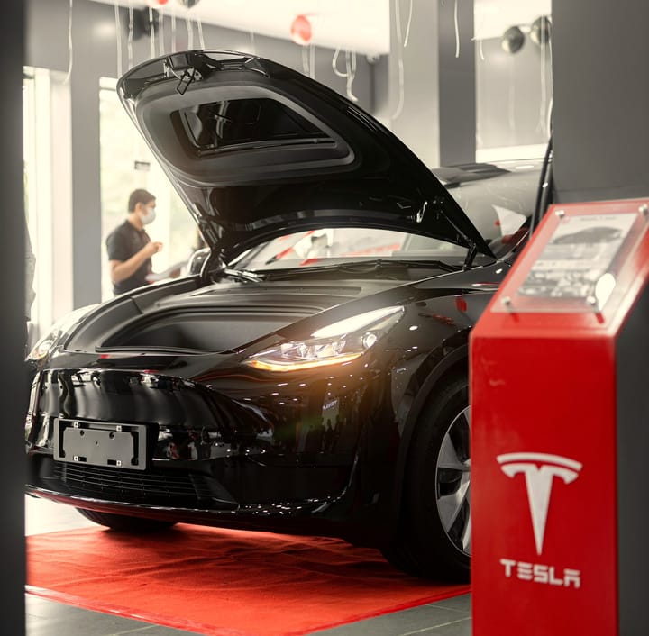 Tesla FSD v14 Enhances Safety, While Robotaxis Face Regulatory Hurdles